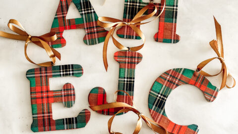 Plaid letter ornaments on marble table